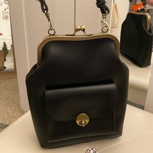 Kiss lock handbag
